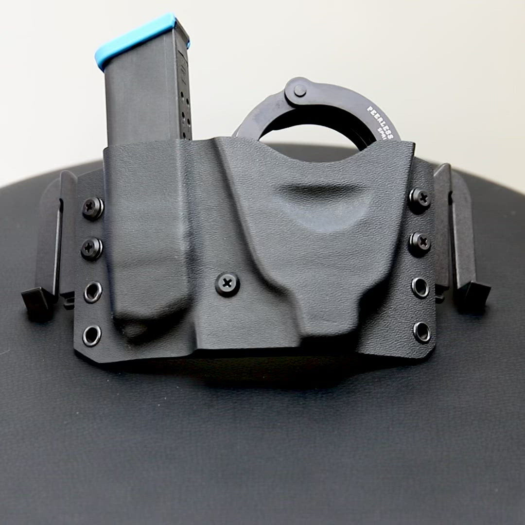 Handcuff/Magazine Holder